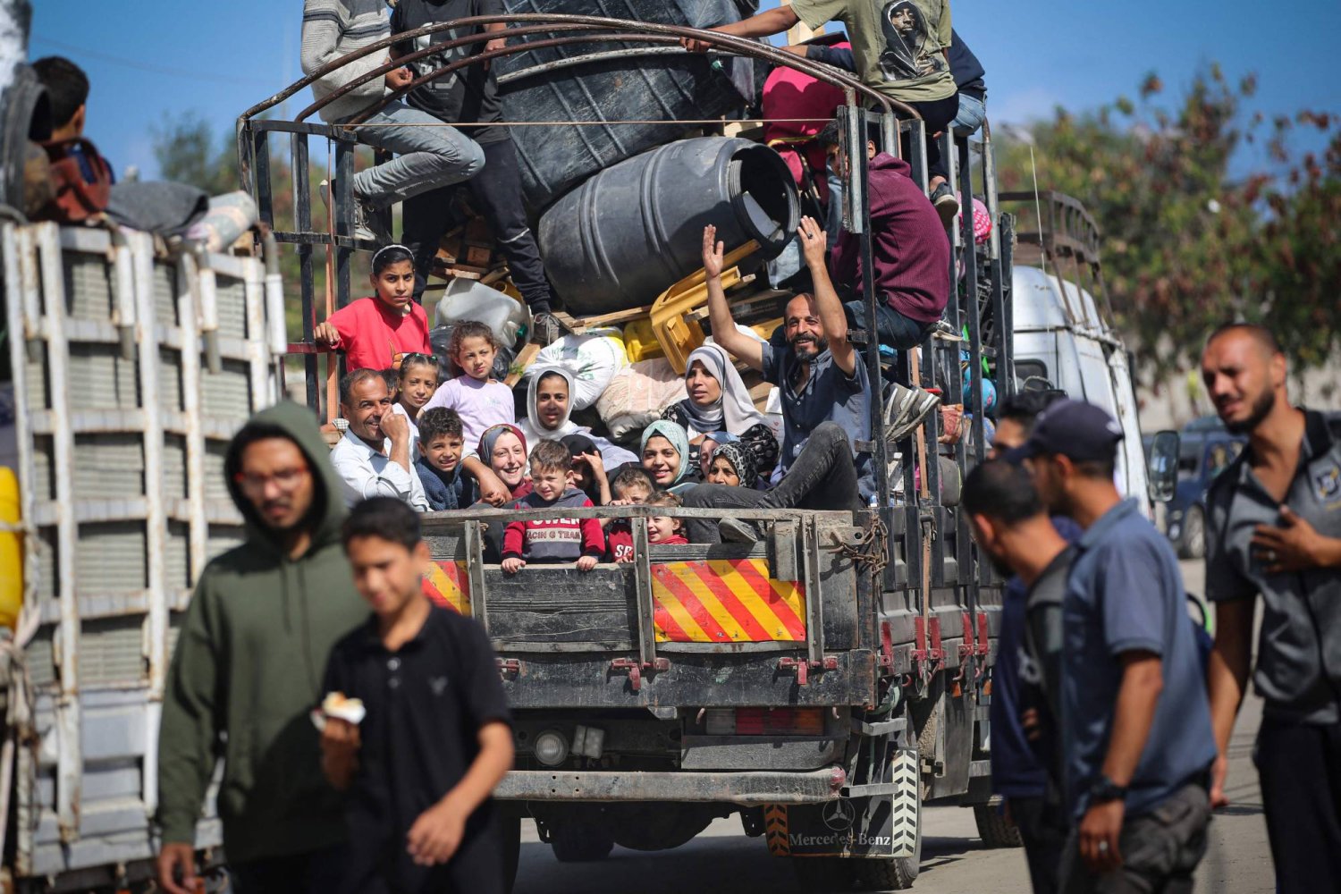 Displaced Palestinians flee Rafah with their belongings to safer areas in the southern Gaza Strip on May 7, 2024 following an evacuation order by the Israeli army the previous day. (Photo by AFP)