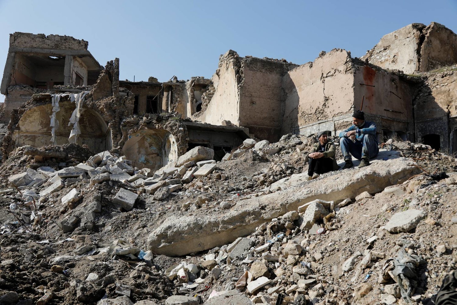 مبانٍ مدمرة في الموصل بالعراق جراء معارك سابقة ضد «تنظيم داعش» (رويترز-أرشيفية)