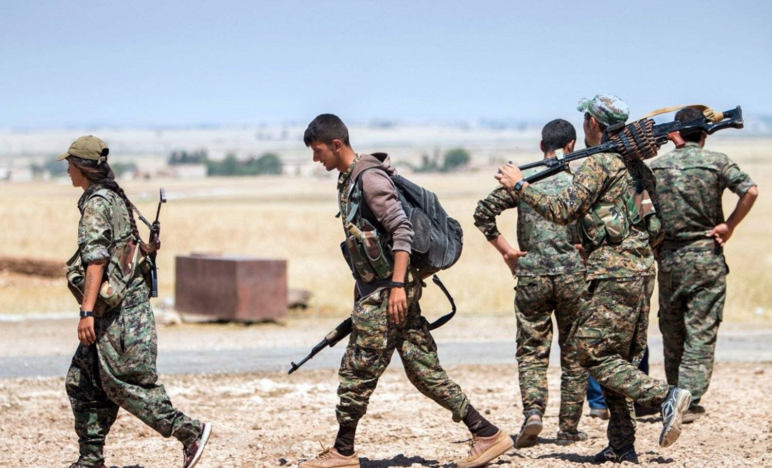 مقاتلون أكراد في بلدة تل أبيض السورية (أرشيفية - رويترز)