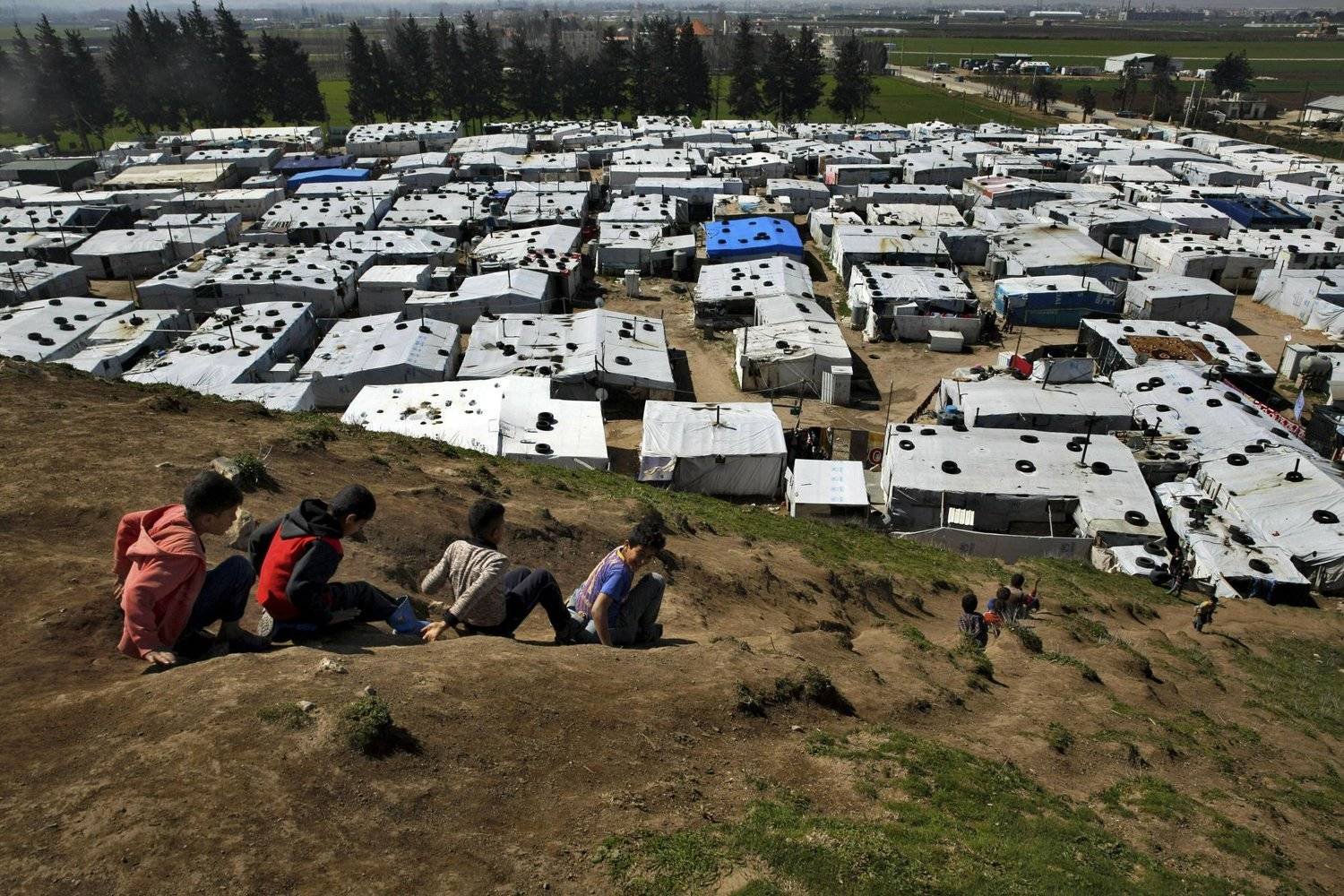 مخيم للنازحين السوريين في بر إلياس بالبقاع اللبناني (أ.ب)