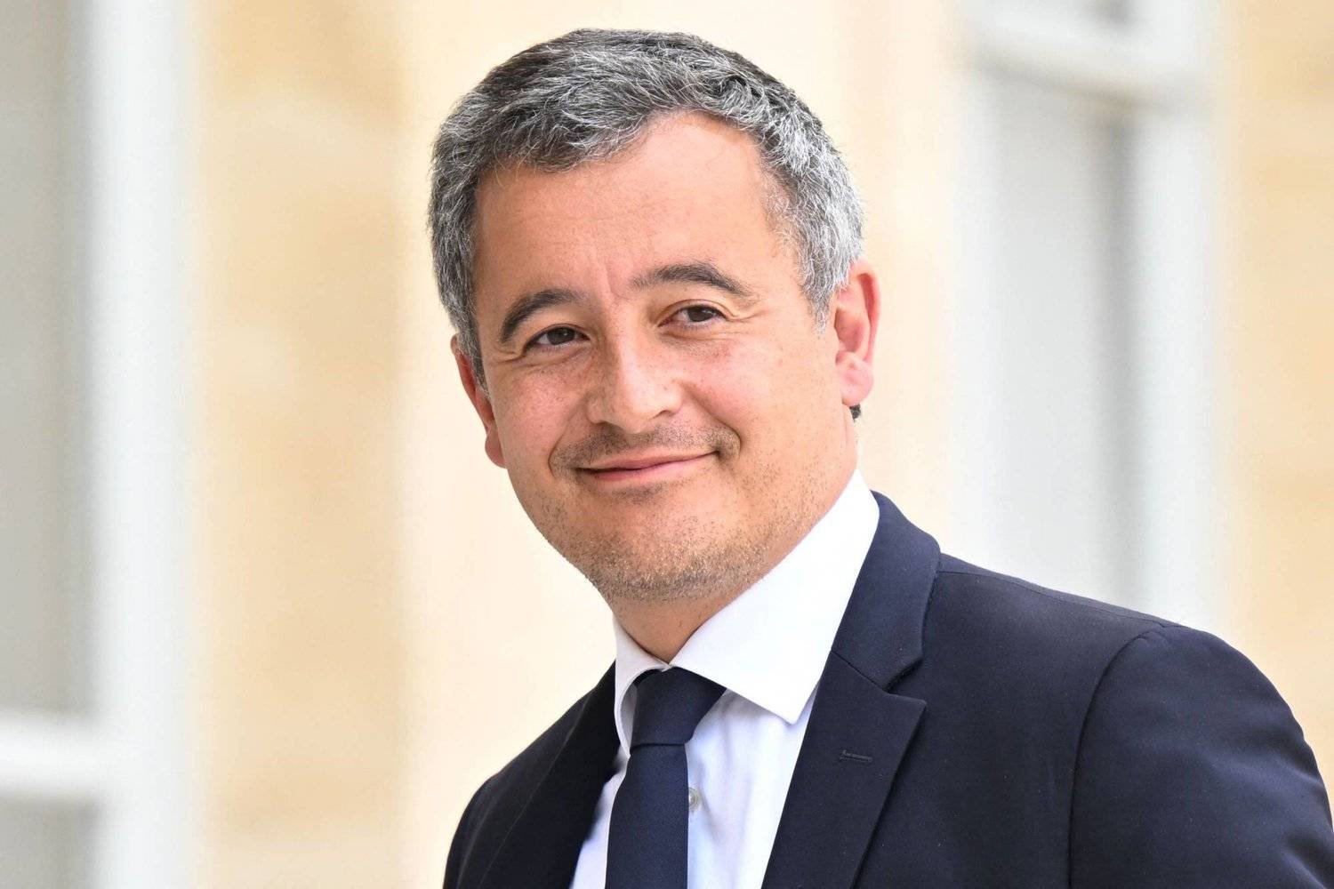 وزير الداخلية الفرنسي جيرالد دارمانان يصل إلى قصر الإليزيه في باريس يوم 19 يوليو 2023 (أ.ف.ب)