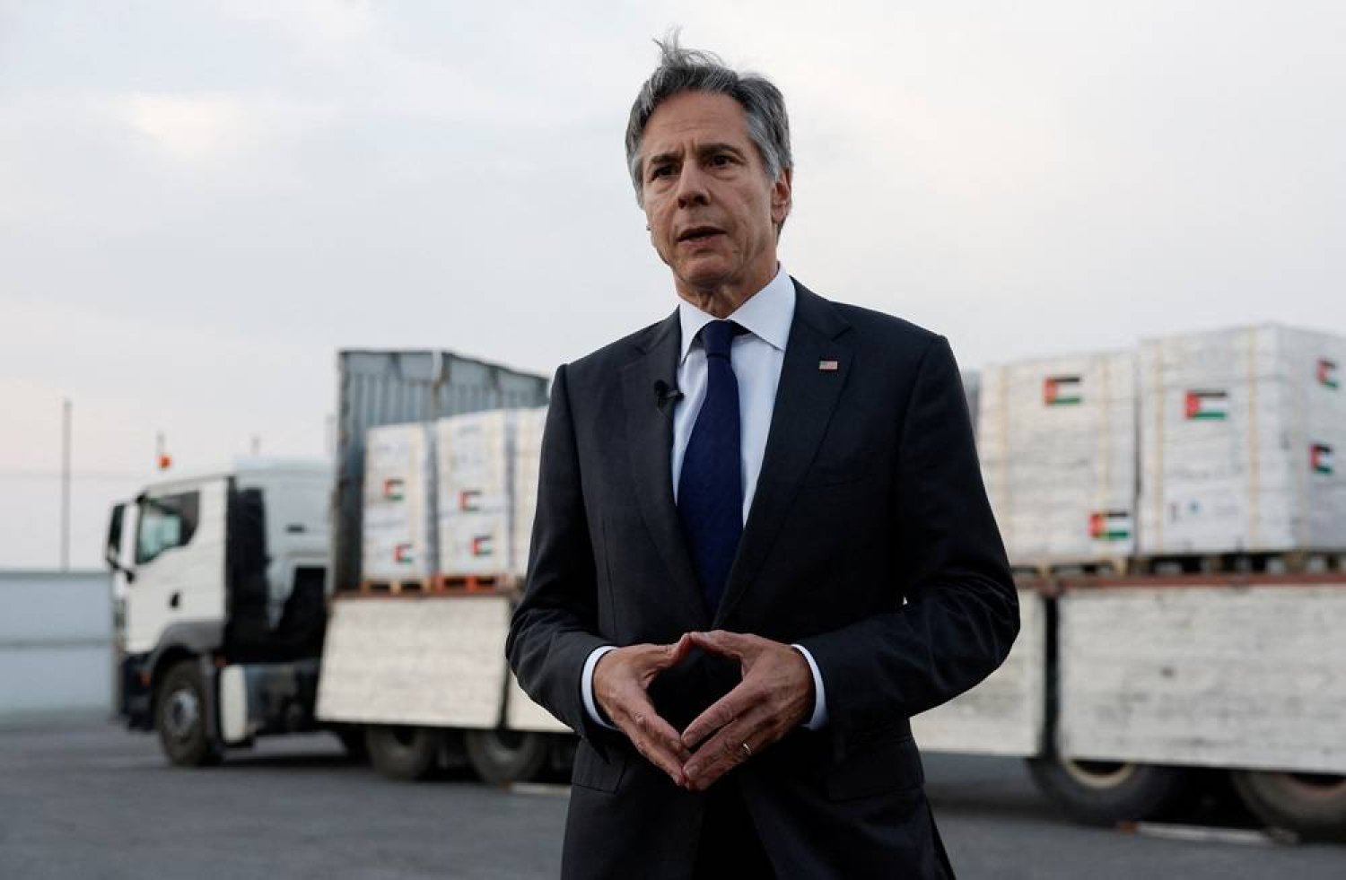 US Secretary of State Antony Blinken speaks to the press in front of truck with humanitarian aid bound for Gaza at the Jordanian Hashemite Charity Organization in Amman, Jordan, April 30, 2024. (Reuters)