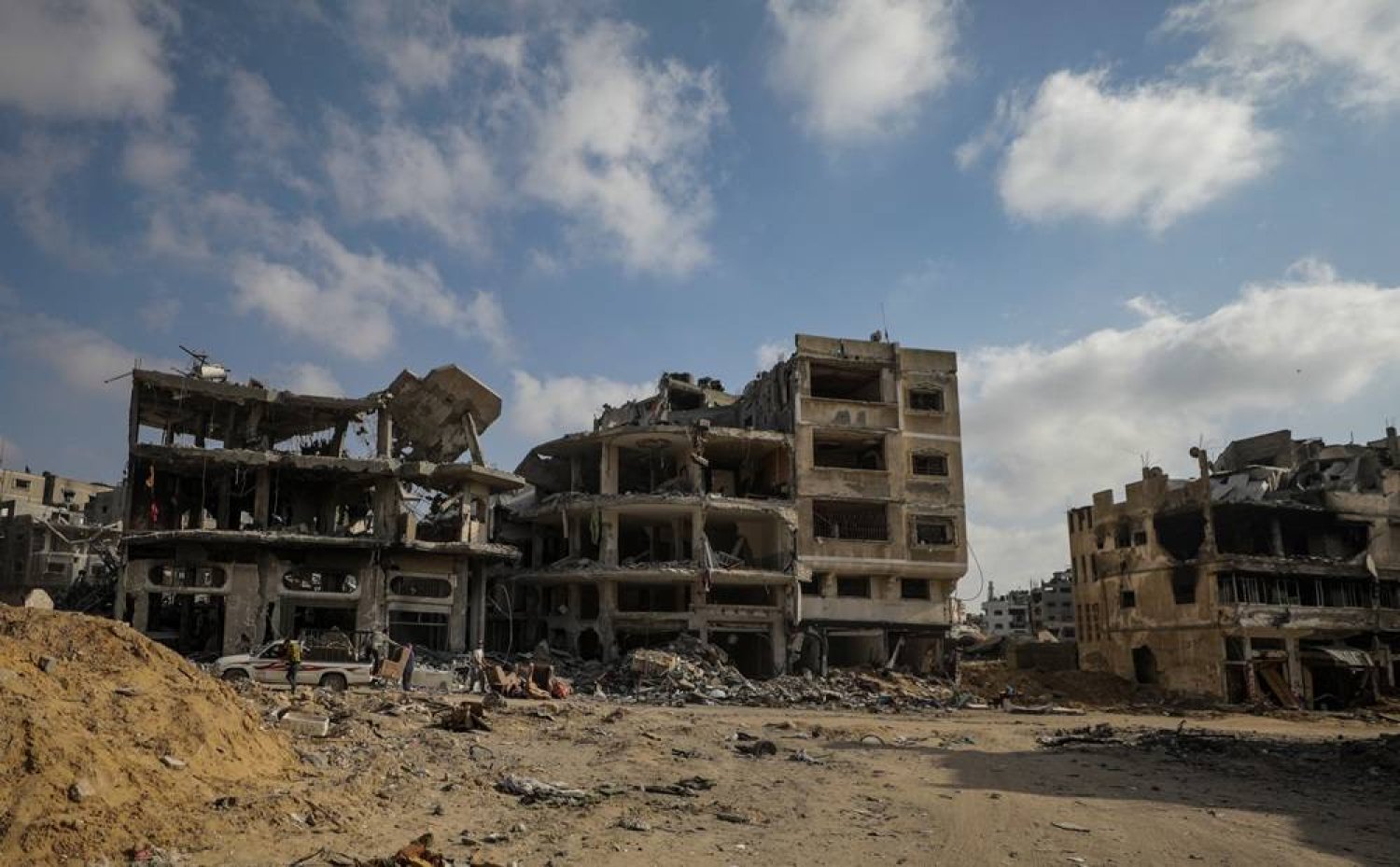 Destroyed buildings in Khan Younis after the Israeli military pulled out troops from the southern Gaza Strip, 30 April 2024. (EPA)
