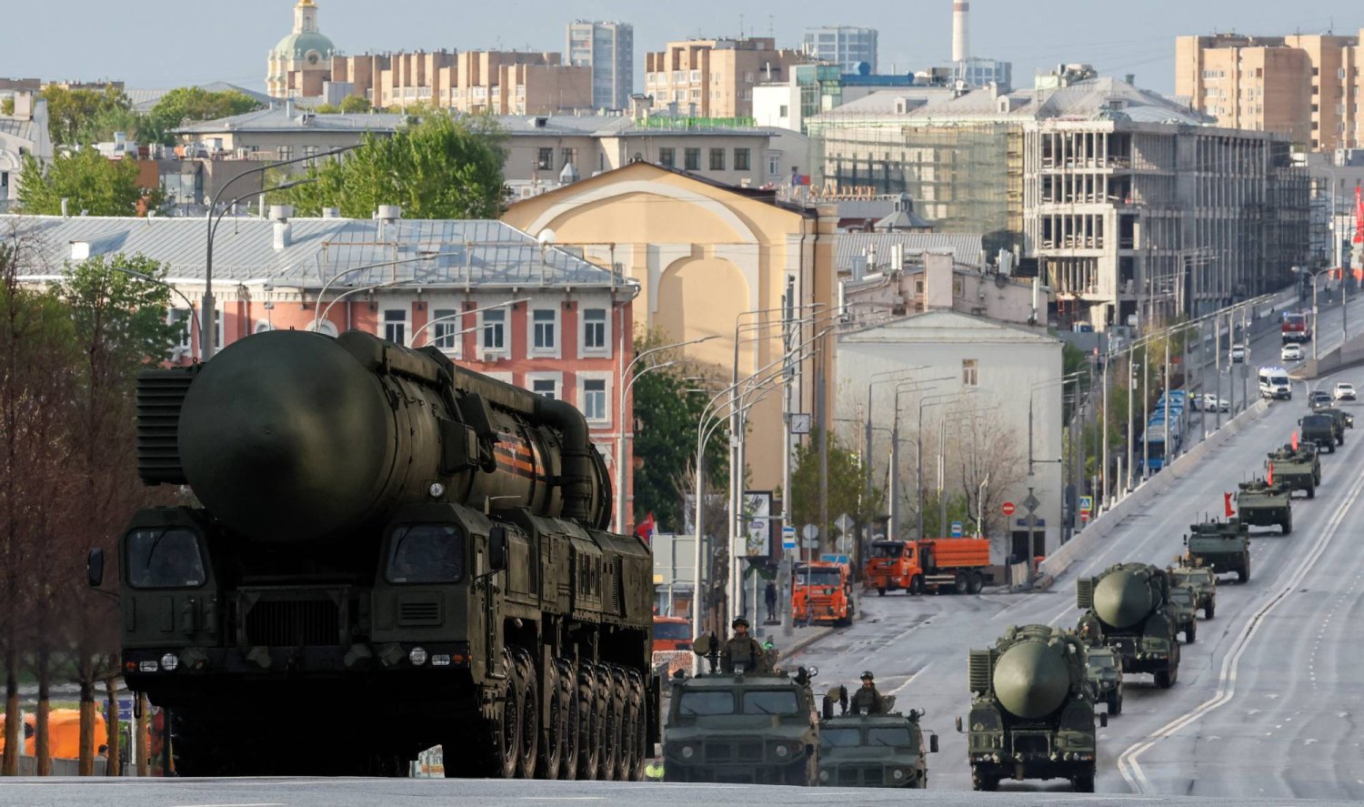 Russian military vehicles, including Yars intercontinental ballistic missile system units, drive along a road before a rehearsal for a parade, which marks the anniversary of the victory over Nazi Germany in World War Two, in Moscow, Russia, May 5, 2024. REUTERS/Shamil Zhumatov