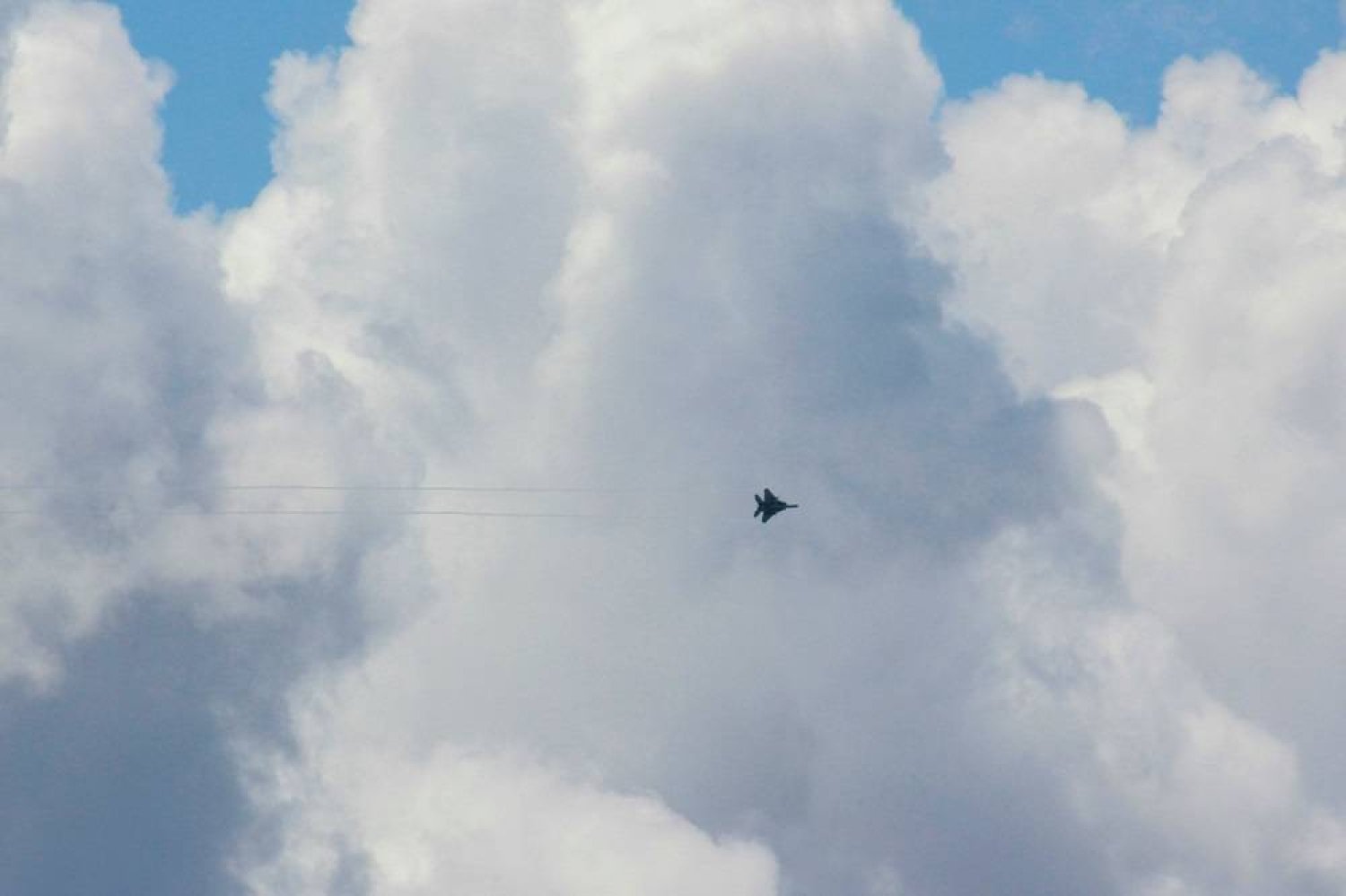 A photo shows an Israeli jet fighter flying over the southern Lebanese town of Marjeyoun on May 6, 2024. (AFP)