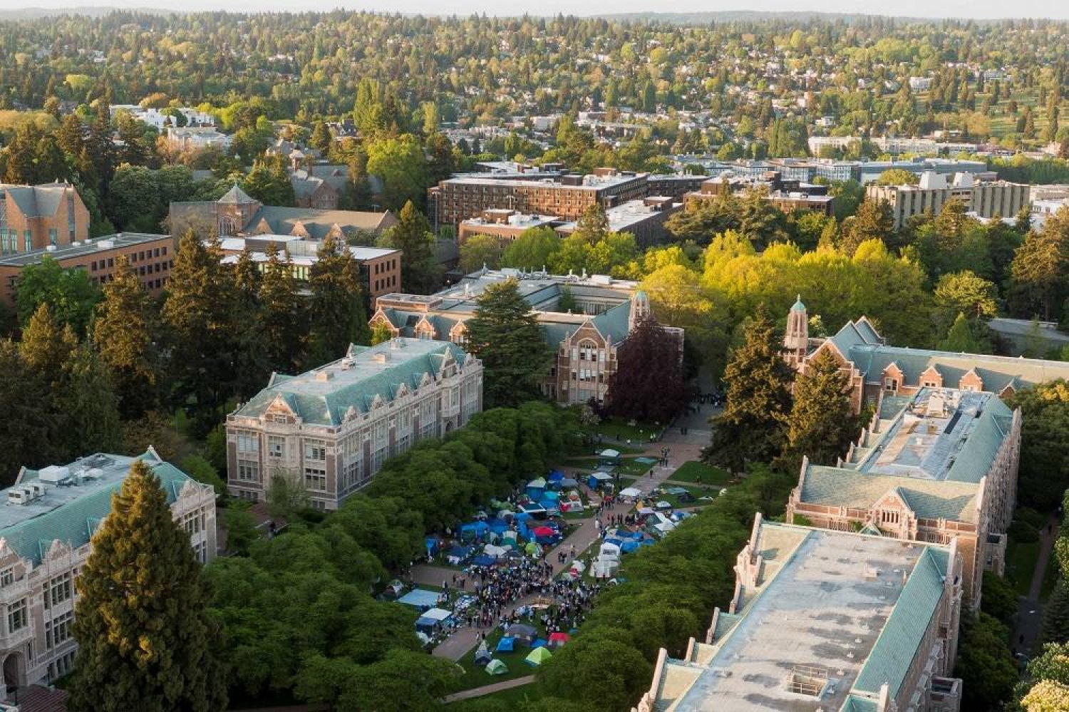 A drone view shows demonstrators rallying at a protest encampment of supporters of Palestinians in Gaza, during the ongoing conflict between Israel and the Palestinian group Hamas, at the University of Washington in Seattle, Washington, US May 7, 2024. (Reuters) 