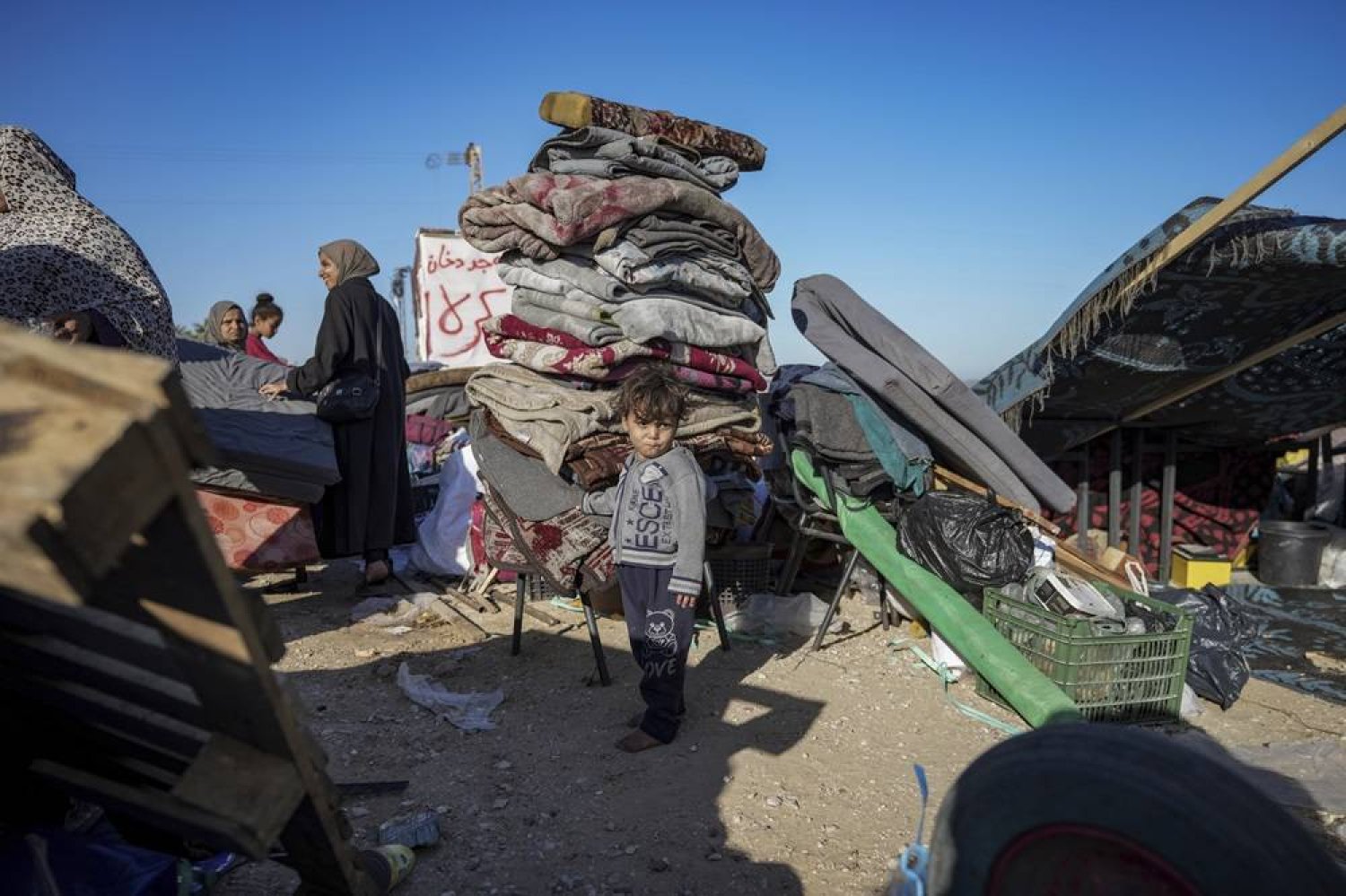  Displaced Palestinians arrive in central Gaza after fleeing from the southern Gaza city of Rafah in Deir al Balah, Gaza Strip, on Wednesday, May 8, 2024. (AP)