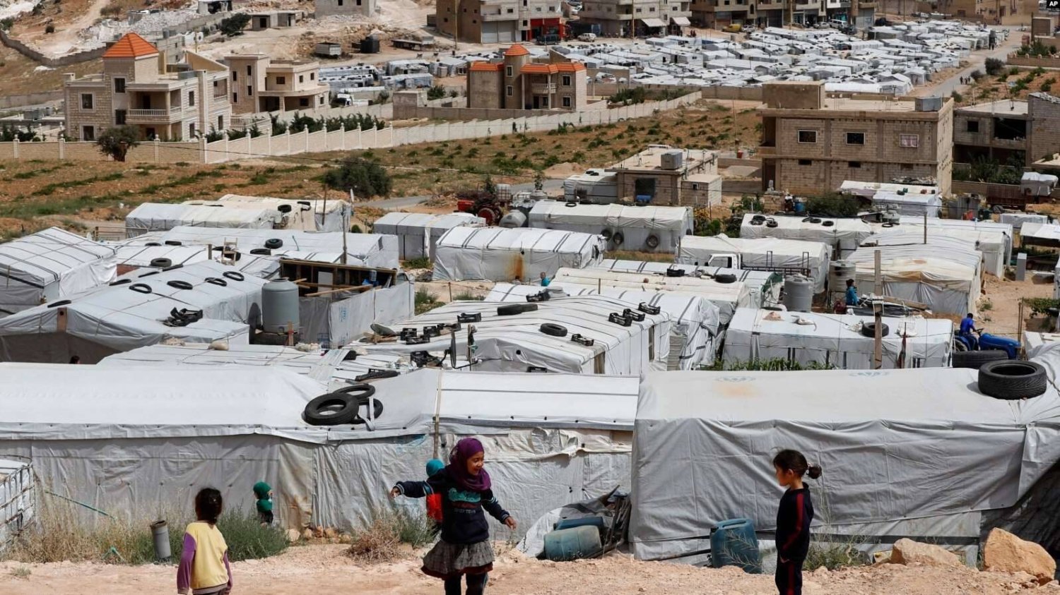 مخيم للنازحين السوريين في بلدة عرسال في منطقة البقاع (أ.ب)