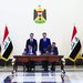 السوداني وبارزاني يرعيان توقيع الاتفاق في بغداد أبريل الماضي (رويترز)