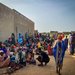 سودانيون هاربون من غرب دارفور عند الحدود مع تشاد (رويترز)
