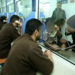 أسرى فلسطينيون خلال زيارة عائلاتهم (صورة من مصلحة السجون)