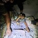 فلسطينيون يعملون على إنقاذ صبي محاصر تحت الأنقاض بعد غارة إسرائيلية على منزل في جباليا شمال قطاع غزة (رويترز)