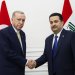 رئيس الوزراء العراقي مستقبلا الرئيس التركي في بغداد أمس (إ.ب.أ)