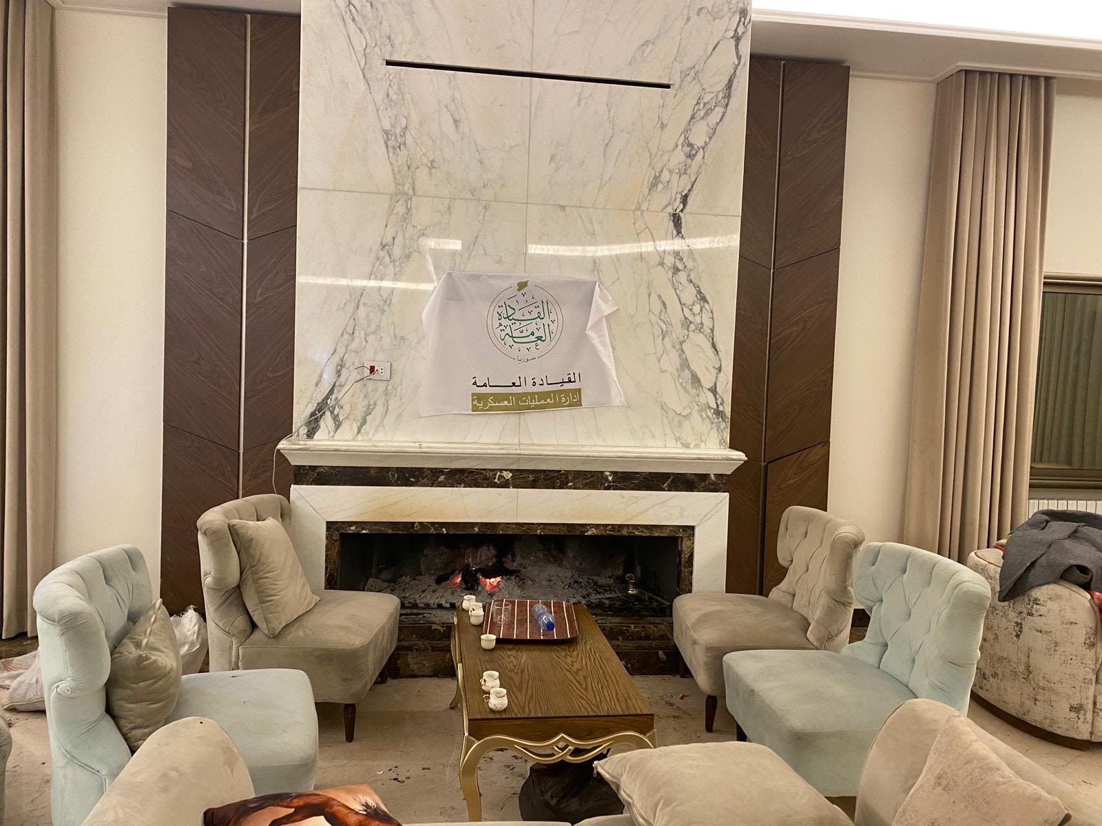 The logo of HTS inside Hassan's house